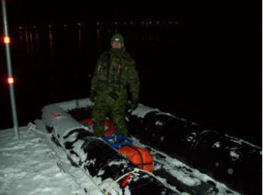 Cpl Therrien ready to load an infantry section into an assault boat.