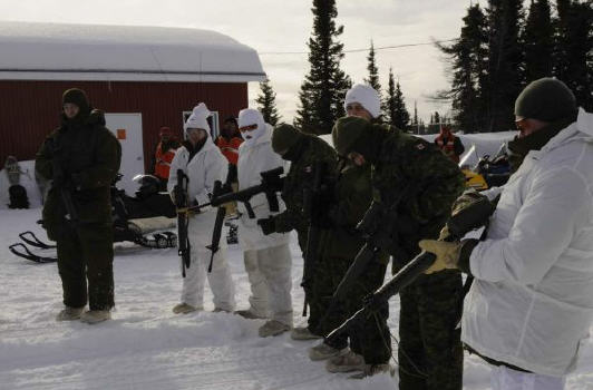 Members of 4 Engineer Support Regiment practice weapons training in snow and icy conditions at 5 Wing during exercise NORTHERN SAPPER. It is important to hone these skills as there are many challenges to working with equipment in an arctic environment.