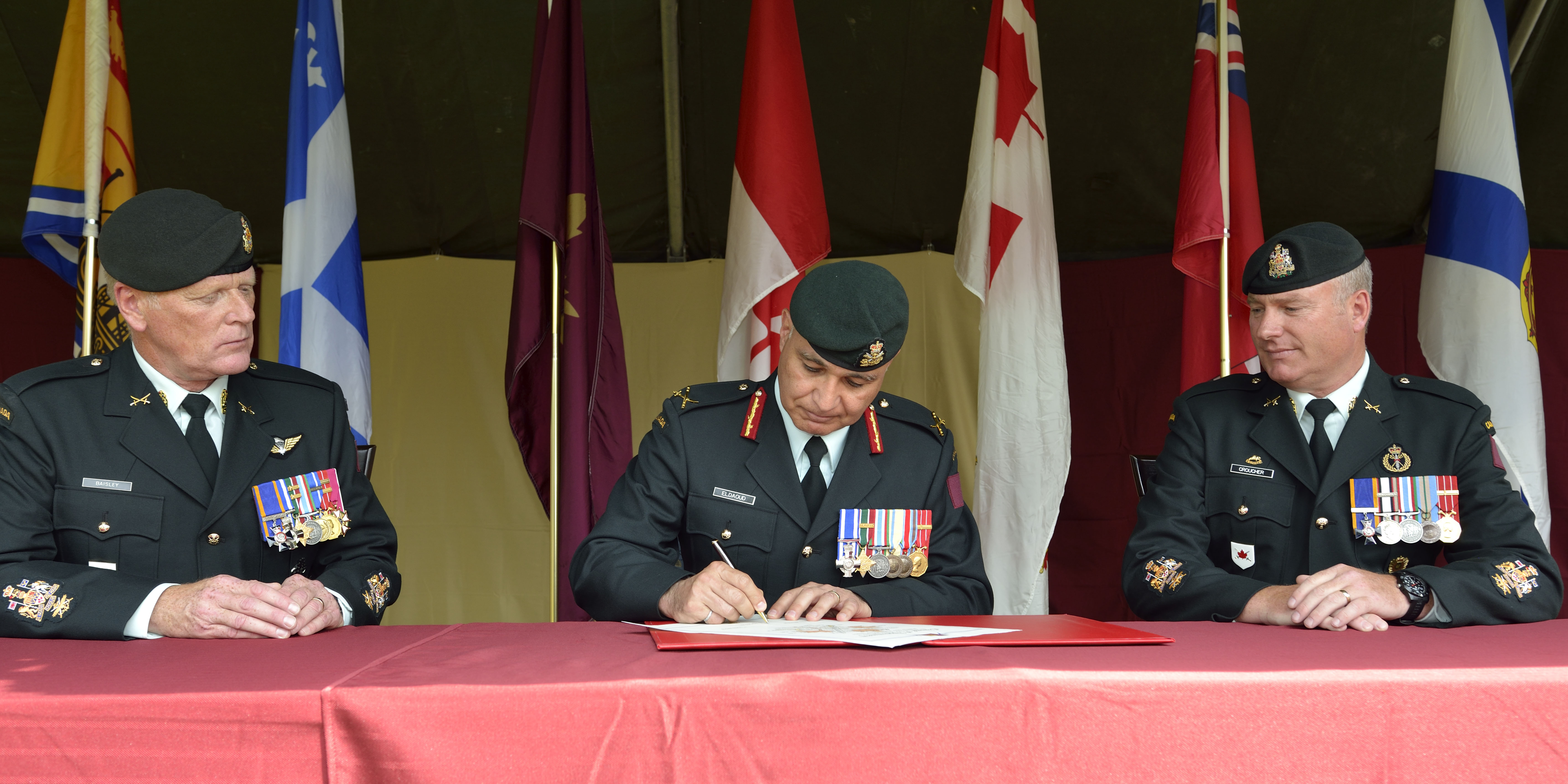 CWO Mark Baisley (RCR) hands appointment to CWO Shawn Croucher (RCE) - Photo by MCpl Robert LeBlanc