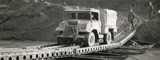 A CANADIAN VEHICLE CROSSES ITALY’S MONTONE RIVER, LATE 1944.