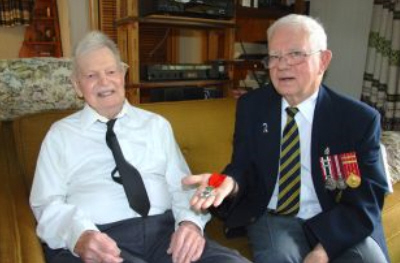 Mr. Russell Power presents French Legion of Honour to RCE veteran Mr. Bill Nicoll. (Photo: Cape Breton Post)