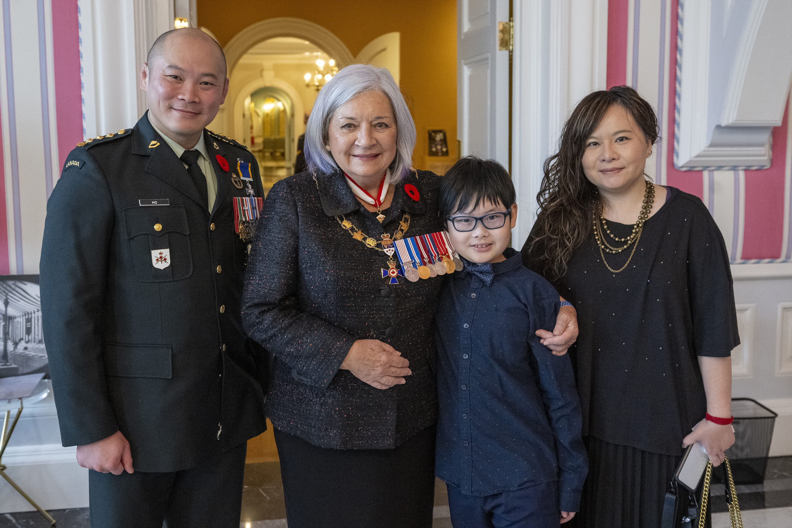 Capt Kyle Ho, MMM, CD and his family with Governor General Mary Simon
