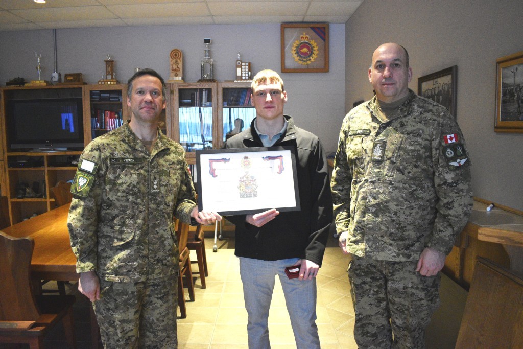 (L-R) LCol Michael Veitch, CO 1 CER, MCpl (Retired) Jordan O’Brien, CWO Brian Leben, RSM 1 CER during the CMEA Retirement Certificate presentation at 1 CER. Photo by Sgt Mizanur Rahman, Sergeant at Arms 1 CER