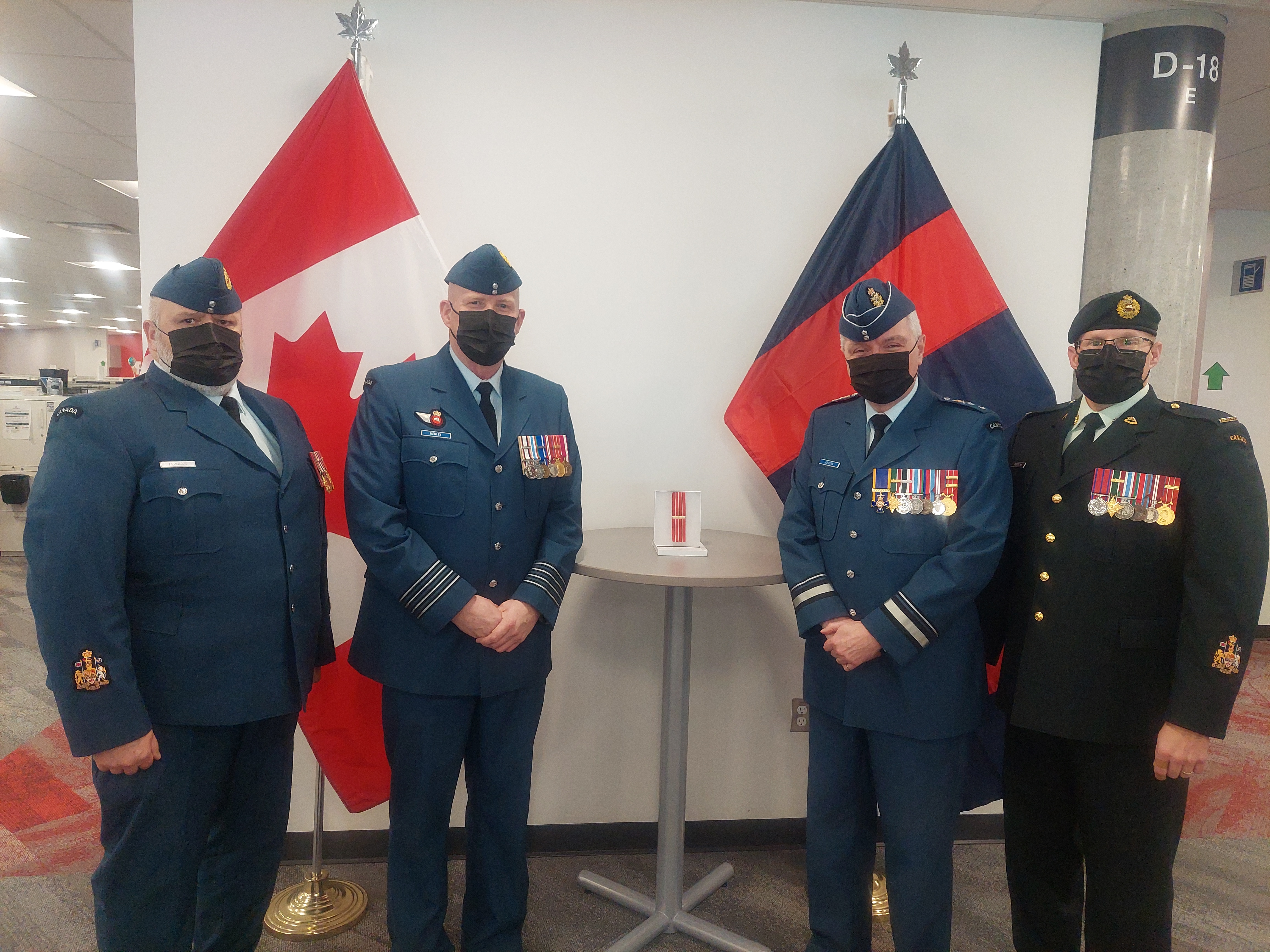 Left to right, CWO Albert Levesque, Col Don Henley of the RP Ops Gp joined by COS IE, MGen Kevin Horgan, and CWO Stacy Merriam, Branch CWO