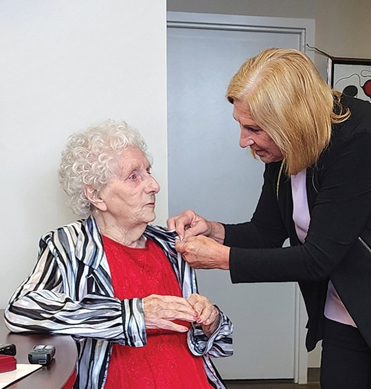Lloydminster MLA Colleen Young presents war bride, Jean Fells, with the Queen Elizabeth II Diamond Jubilee Medal at her constituency office earlier this month.  Jeannette Benoit-Leipert Meridian Source