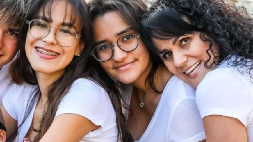 Gabby in the centre with her mum on the right