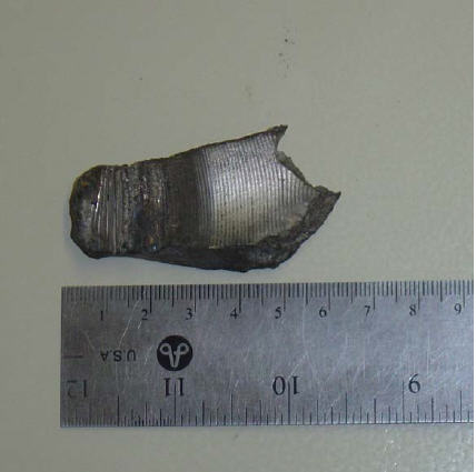 Piece of shrapnel from IED blast