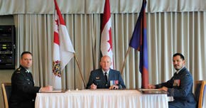 Colonel Don Henley oversees the transfer of Command of RPOU(P) between Lieutenant-Colonel David Burbridge and Lieutenant-Colonel Michael Ulloa.