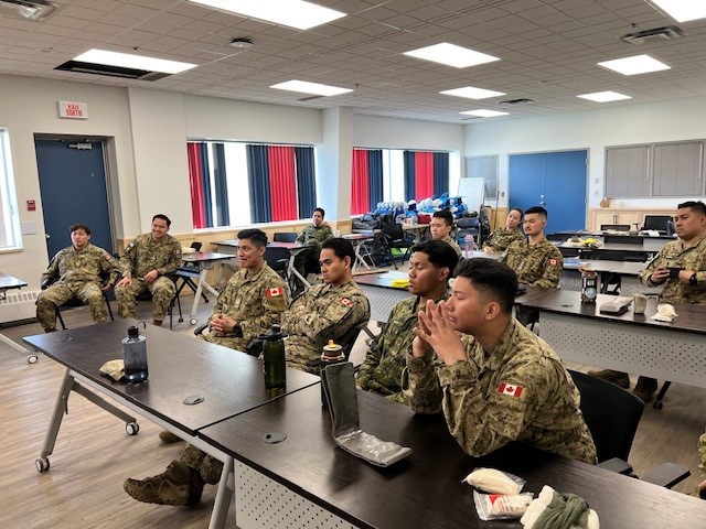Soldiers from 1 PPCLI and Sappers from 1 CER engage in a DTCAN introduction session, learning about upcoming cultural awareness initiatives.