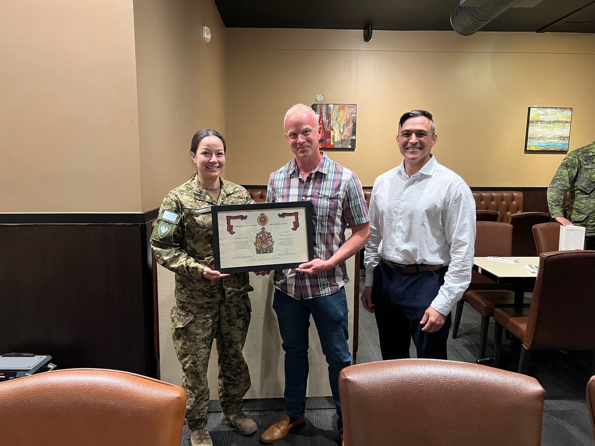 Presenting Canadian Military Engineer Association Certificate – (L-R) Maj Melissa Gilbride, DCO, 1 CER, Maj Robert Machin (R), RPOU(W) DCO and Maj (retired) Jay Berry (R). Photo by Capt Kyle Ho