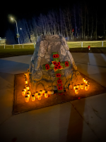 Captain Trent Klimack (left) and Sapper Thomas Giavedoni (right) showing respect to the Fox Creek, Alta. cenotaph. Photo by Capt Kyle Ho, Real Property Operations Unit (West)