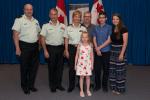 A ceremony was held at the Canadian Forces College in Toronto to promote Brigadier-General Jennie Carignan as the first female combat arms general officer in the Canadian Armed Forces. Present at the ceremony are (L to R) Chief Warrant Officer Robert McCann, Major-General Eric Tremblay, BGen Carignan, daughter Camille, husband Eric Lefrançois, son Ian and daughter Amelie./Une cérémonie a eu lieu hier au Collège des Forces canadiennes à Toronto pour souligner la promotion de la brigadier-général Jennie Carig