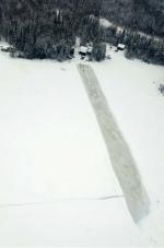 Aerial view of the ice bridge created by 35 CER engineers. // Une vue aérienne du pont de glace créé par les ingénieurs du 35 RGC. (Photo: Maj Simon Germain)