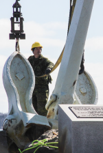 Members of 144 and 143 Construction Engineering Flight, based out of Pictou and Bridgewater, conducted the repair work on the Bonaventure Memorial, and used a crane on March 19 to connect the anchor to the newly built metal mounts. Photo: Ryan Melanson, Trident