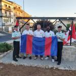 Col Comdt, Branch CWO and three members of 33 CER pose in front of RCE Monument in Leonforte, 26 Jul 23