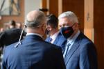 2.	The CME, MGen Kevin Horgan, porting the NSJEC mask speaks with a NATO colleague.