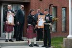 Mayor Randy Boyd (left) presents Lieutenant-Colonel Ryan Smith, Commanding Officer of 1 Combat Engineer Regiment (1 CER), with a scroll granting 1 CER the Freedom of the City in Bon Accord, Alberta on June 3, 2017. Photo by: Master Corporal Andrew Davis, 3rd Canadian Division Support Base Edmonton. © 2017 DND-MDN Canada