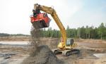 Sifter bucket aerating petroleum hydrocarbon impacted soil at the Survival Tank Farm site at CFB Goose Bay, NL