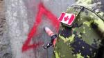 An RCAF USAR team member uses a core drill to create an inspection hole (Photo by Rose Gould, Mass TF1)