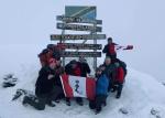 An ecstatic team at the highest point in Africa