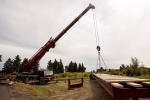 Crane Preparing to Lift Bridge Superstructure into Place on its Foundations