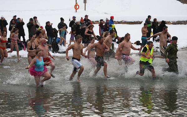 Seventy-seven brave souls kicked off 2017 with a splash as the 31st annual Polar Bear Swim brought a large crowd of spectators and some eager swimmers to Gyro Park in Trail.— Image Credit: Guy Bertrand Photo