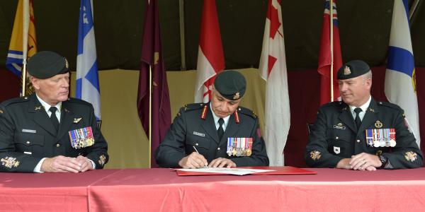 CWO Mark Baisley (RCR) hands appointment to CWO Shawn Croucher (RCE) - Photo by MCpl Robert LeBlanc