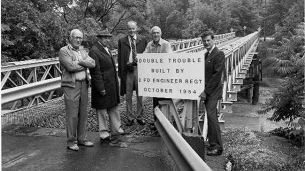 After Hurricane Hazel, officers from the 2nd Field Engineer Regiment created a Baily Bridge. In 1984, members of the regiment including, from left to right, are Lt/Col Ron Milne, Lt/Col Art Keith, Captain Tom Hatch, Major Mid Kitchen, and Lt/Col John Wasteneys, were granted was granted the Freedom of Metropolitan Toronto in recognition of its work in restoring bridges in southern Ontario in 1954. Oct. 7, 2016. (Mid Kitchen photo)