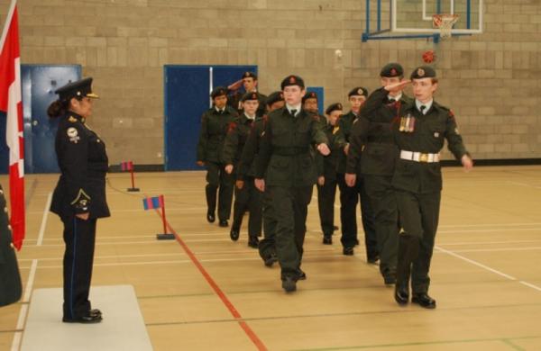 The cadets march past Reviewing Officer St'atl'imx Tribal Police Chief Officer Deborah Doss-Cody.