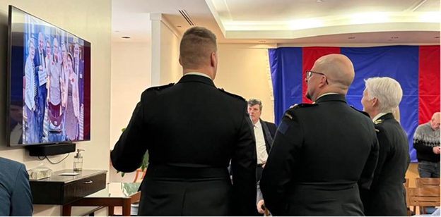 A look back at a life well spent, LCol Audet (CO 2 Fd Arty Regt), LCol Genest (CO 34 CER) and General Carignan look at images of the life of Sapper Thibeault.